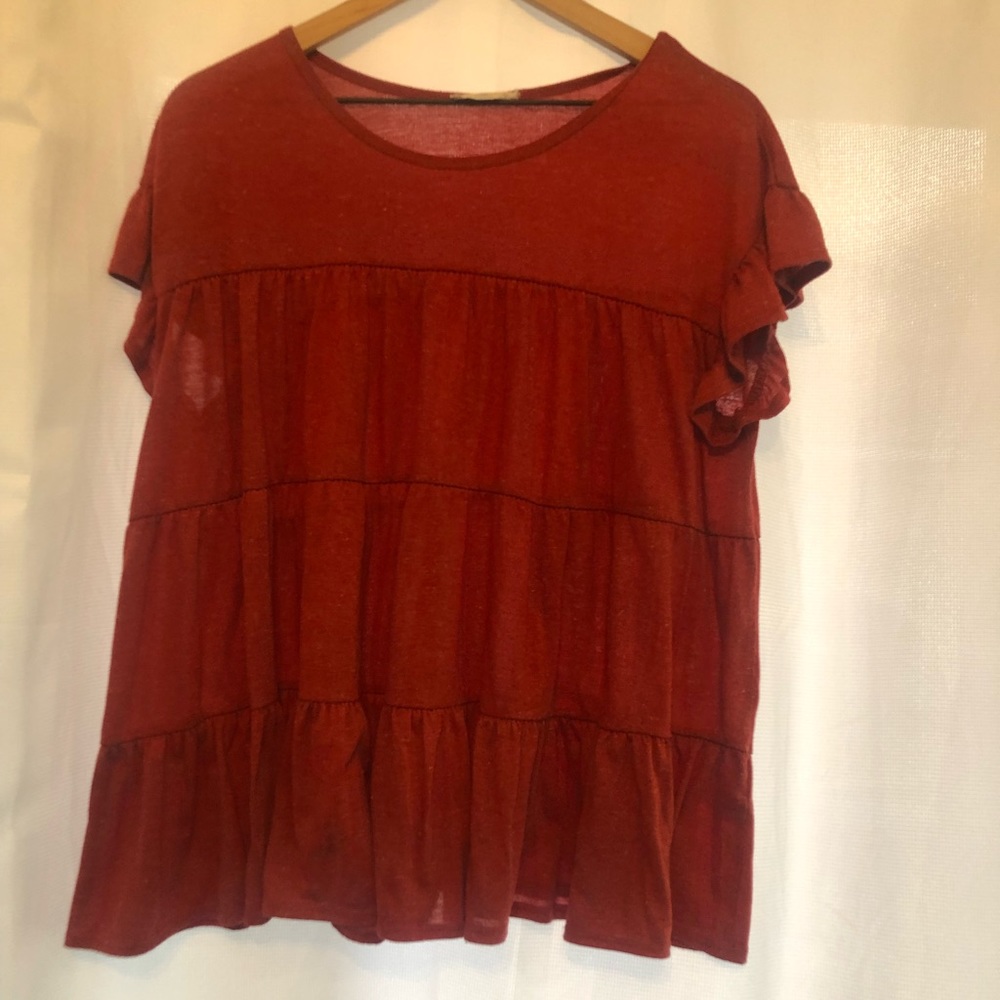 Red ruffled shirt